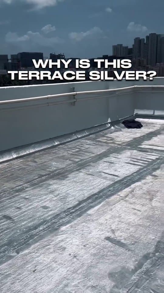 Terrace at Marvel Apartments, Marol, covered in a continuous waterproofing membrane with a silver reflective finish, titled Why is this terrace silver?